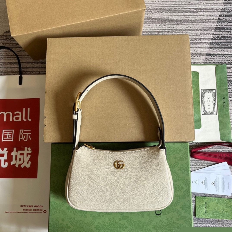 G*u*i top handle bags